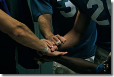 football players, huddle