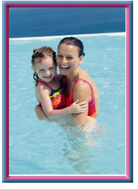 Baby and mother swimming in pool.