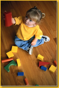 Girl Playing with Blocks