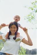 Mom with baby on shoulderes